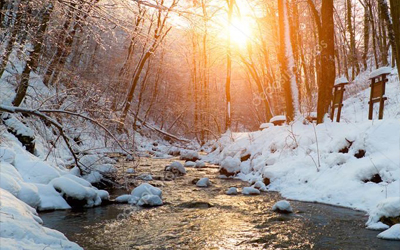 Snowy river at sunrise